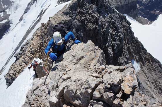 Me climbing up the rock step. Photo by Ferenc