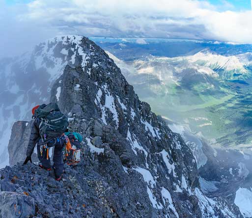 Careful foot placements are absolute on this exposed ridge. Photo by Vern