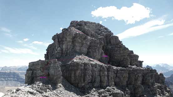 Here's a review of the summit tower. The lower band I attacked head-on was 4th class. The upper band that I ascended through a chimney on climber's right is the crux (4th with a few low 5th class moves).