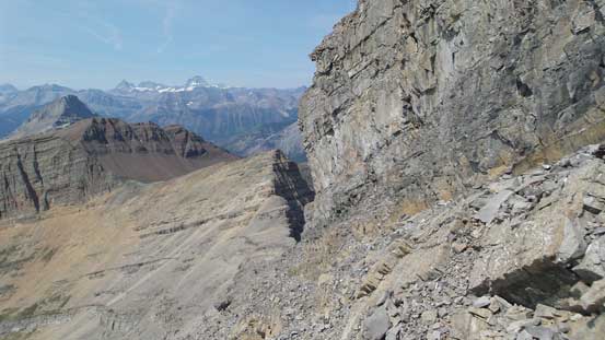 Bypassing the crux on climber's right side on (loose) ground