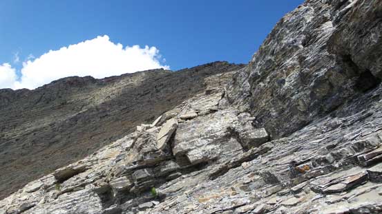 Traversing towards the higher peak. This is the typical terrain