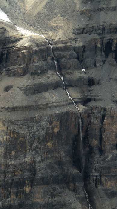 A waterfall and the typical cliffs in this area