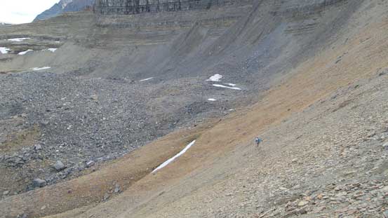 Descending scree into the boulder bowl..