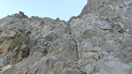 Ascending the first cliff band up a gully system