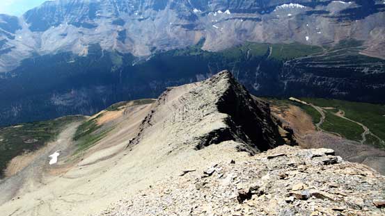 Continuing descending on this loose ridge.