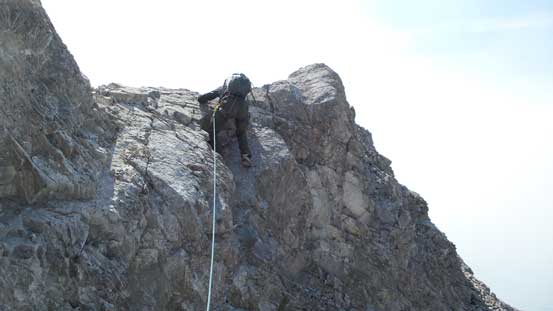 Robb negotiating a short down-climb on Pitch 2