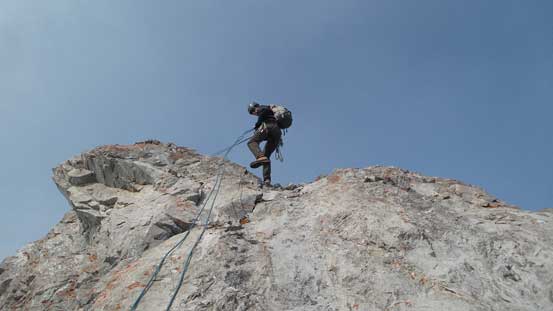 Robb rappelling the summit block (Rap 1)