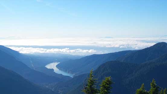 The lower mainland was covered by low clouds. Capilano Lake in front