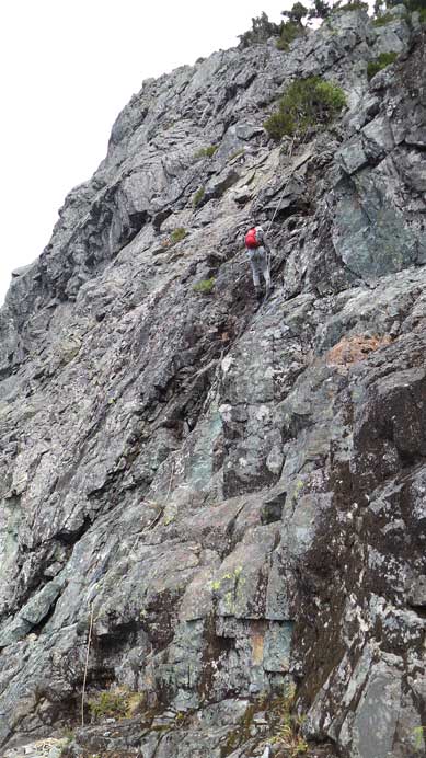 Vlad rappelling the crux pitch