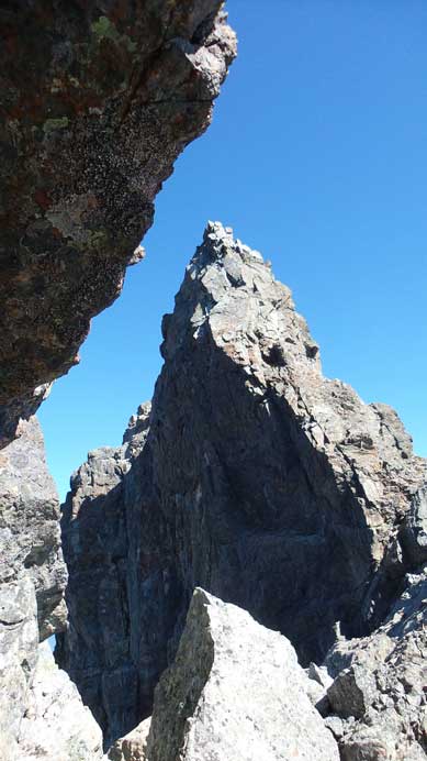 Ahead is the gendarme that I bypassed on climber's right