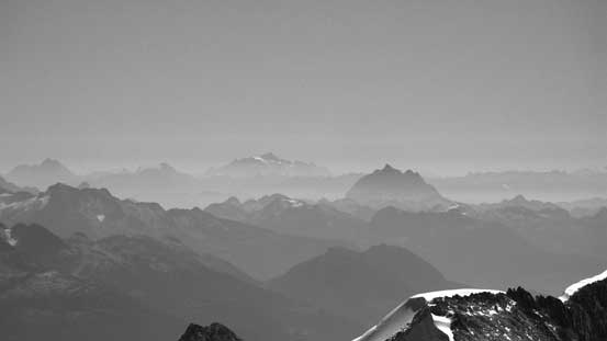Behind Mt. Robie Reid (fg, R) is Mt. Shuksan (bg, center)