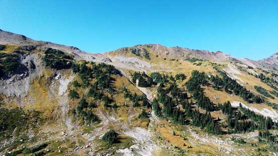 Ahead is the slog back up the high shoulder from Gentian Pass...