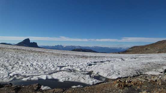 The tip of Black Tusk pokes behind Helm Glacier