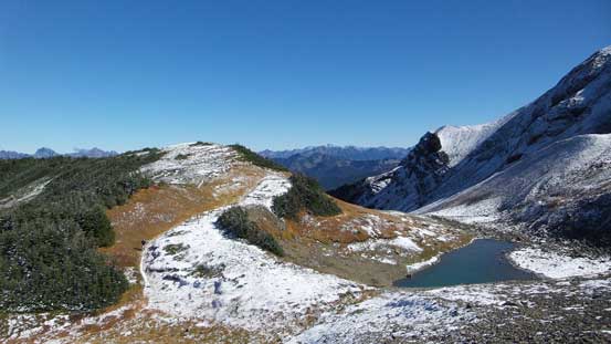 A beautiful tarn below Chowder Ridge. Note the fresh snow
