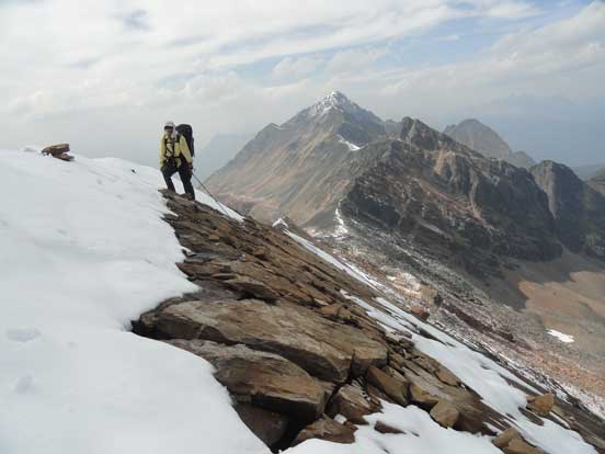 Me on the first highpoint, likely the true summit. Photo by Maury