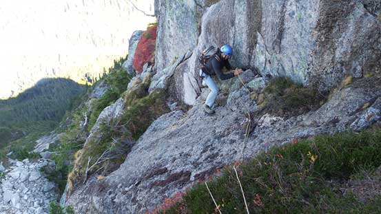 Another shot of Vlad down-climbing the slab corner