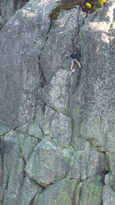 Looking back at the other climber leading the P2 on Escape Velocity