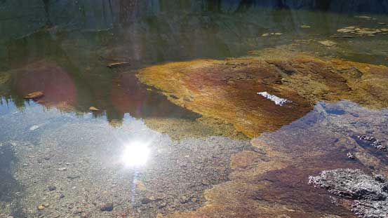 The reflection of the Sun in this tarn