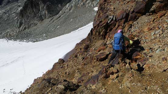 Descend the loose and tricky step above the lower glacier