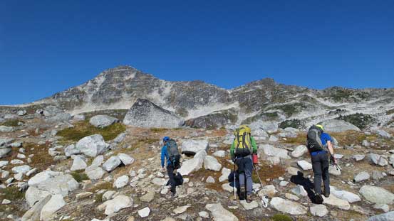 Guys marching up. Mt. Taillefer in the background
