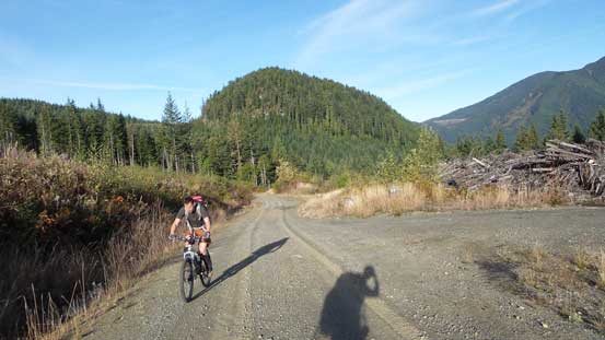 Simon biking up the road