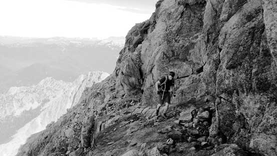 Here's the down-sloping ledge traverse to bypass the upper wall