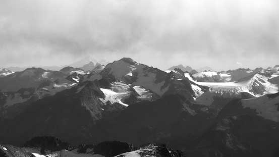 Nivalis Mountain by McBride Range. Behind way in the distance is Mt. Baker