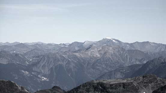 Whitecap Mountain looms behind the triple summits of Birkenhead Peak