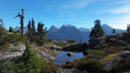 Another tarn on the summit plateau. Moe/Cook/Weart behind