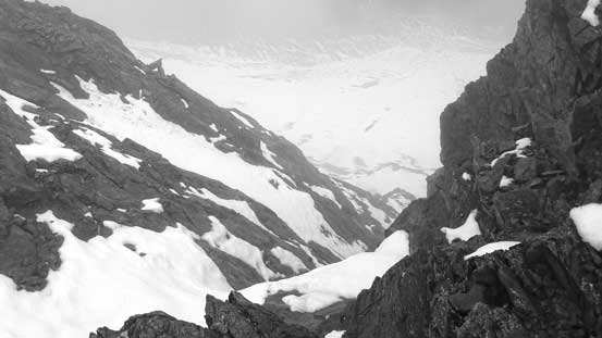 The NE side was a shear drop off.. You don't want to take a ride down that way...