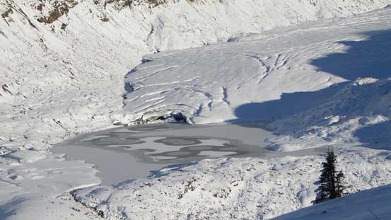 The toe of Helm Glacier and a frozen glacial lake
