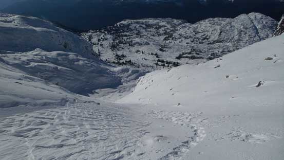 Steep gully descent into the lower bowl
