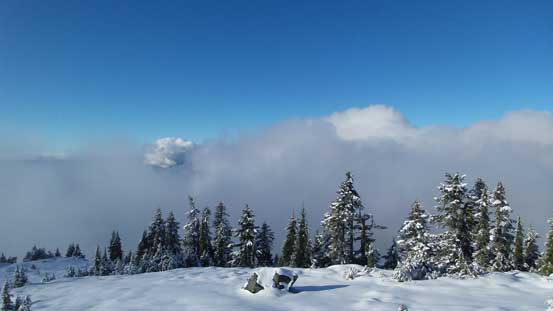 On the south summit now. Clouds were building up