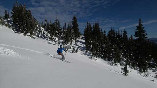 Alex having fun skiing down