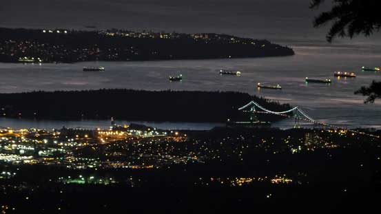 That bridge is the famous Lions Gate Bridge (usually has 1 hour traffic delay in the 'wrong' time)