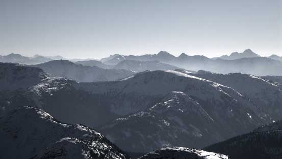 The dome-shaped peak in foreground is unofficially known as The Flatiron.