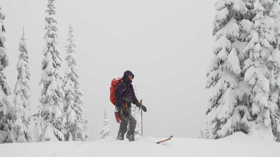 Alex on the summit enjoying the weather.