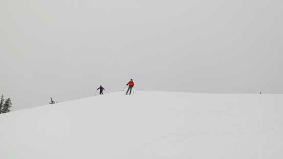 Skiing off the summit of Iago Peak
