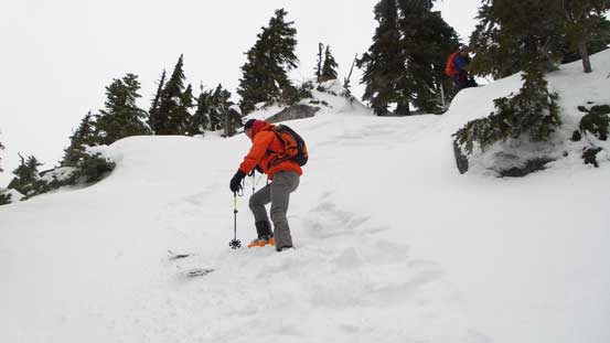Skiing down the steep terrain from Iago towards the col