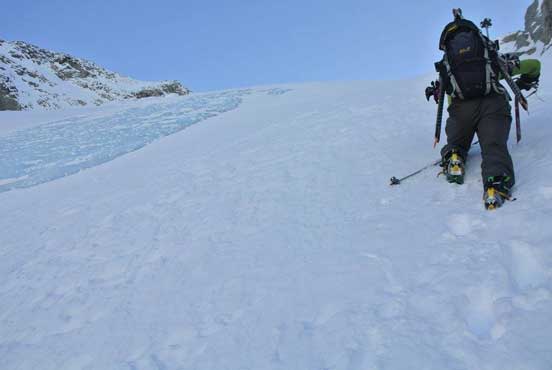 Me charging up the slope. Photo by Alex