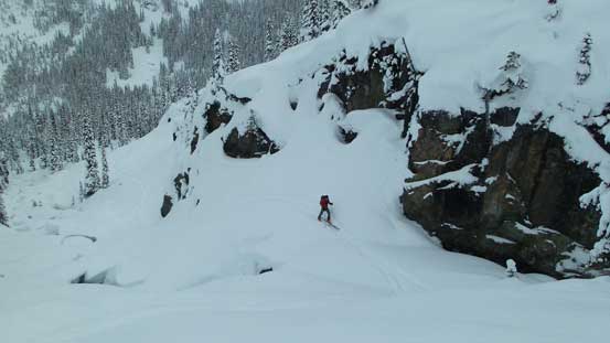 Ben skinning up the outflow drainage of Long Lake