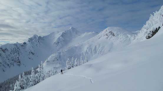 Alex skinning up with the majestic Cloudraker Mountain behind