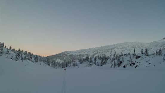 Skinning across Long Lake in the morning