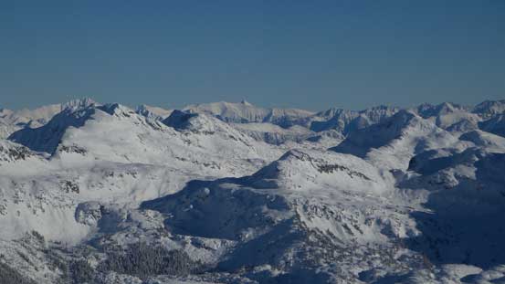 Looking over the summits of Anemone, Tabletop and Arrowhead towards peaks in eastern Stein