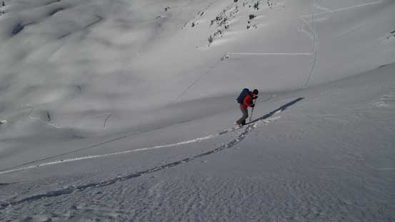 Ben switchbacking up to the col