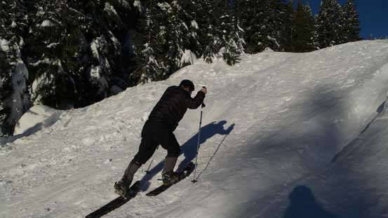 Dad snowshoeing up