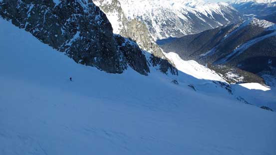 Skiing down Anniversary Glacier