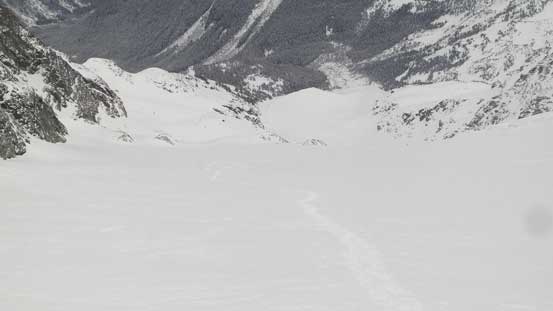 Plodding down Anniversary Glacier