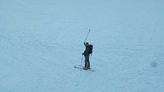 Alex on the middle Joffre Lake, pointing towards our objective