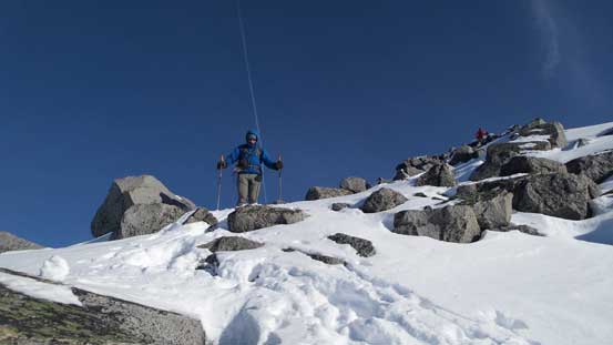 Negotiating the snow covered boulders
